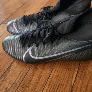 Nike Black Soccer Cleats with Silver Swoosh Accent